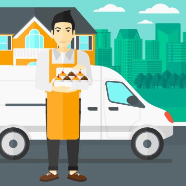 Baker 'ın elinde bir kutu pasta..