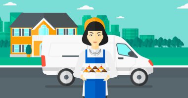 Baker 'ın elinde bir kutu pasta..