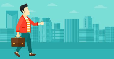 İş adamı çantayla yürüyor..