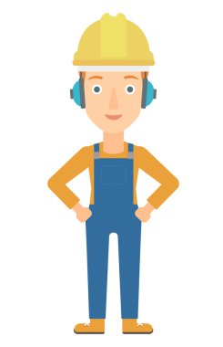 Woman wearing hard hat and headphones