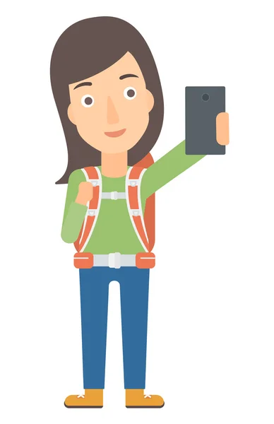 Backpckaer haciendo selfie . — Vector de stock