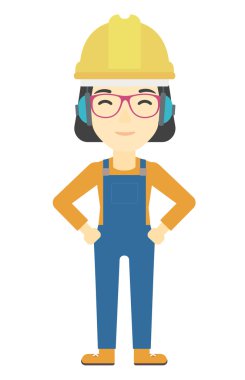 Woman wearing hard hat and headphones