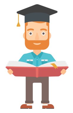 Kitap mezuniyet şapkalı adam.