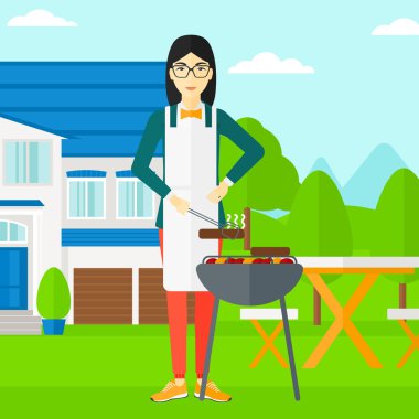 Kadın hazırlanıyor Barbekü.