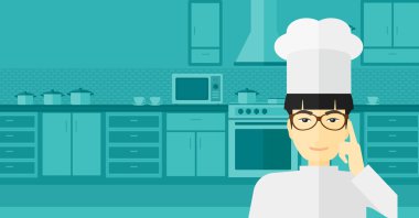 Chef pointing forefinger up.