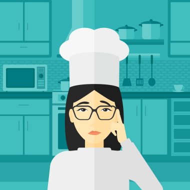 Chef pointing forefinger up.