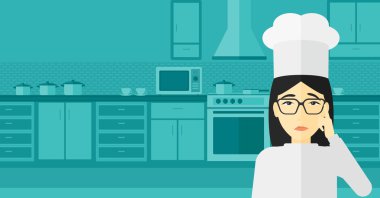 Chef pointing forefinger up.