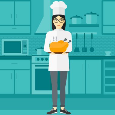 Woman holding roasted chicken.