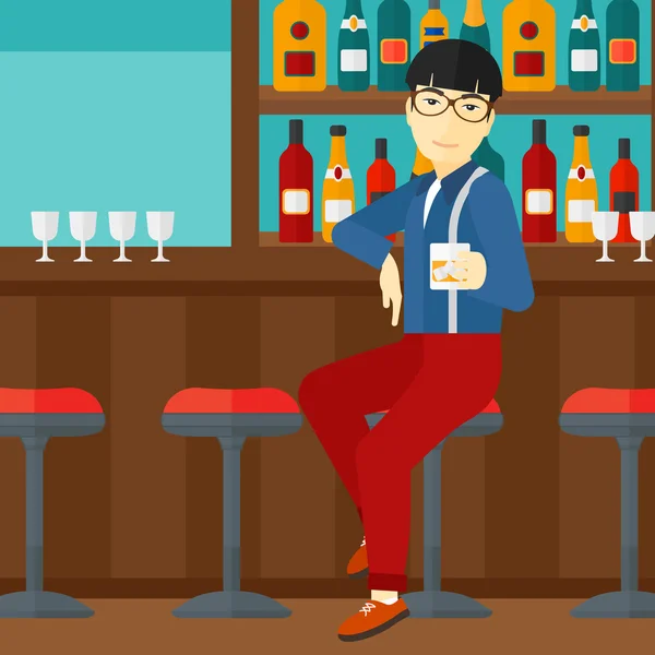 Hombre sentado en el bar . — Vector de stock