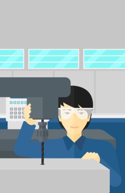 Sıkıcı ile çalışan erkeğin değirmen.