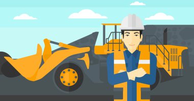 Madenci arka plan üzerinde madencilik ekipmanları ile.