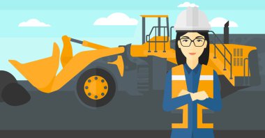 Madenci arka plan üzerinde madencilik ekipmanları ile.