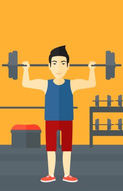 Adam halteri kaldırıyor..