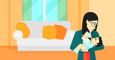 Bebeği besleyen kadın.