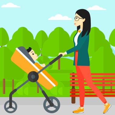 kadın iterek çocuk arabası.