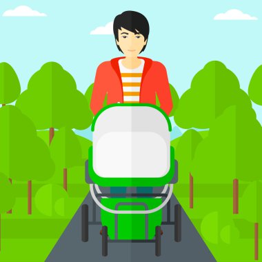 Adam iterek çocuk arabası.