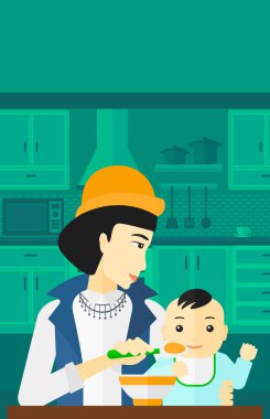 Bebeği besleyen kadın.