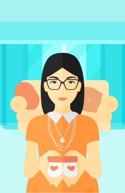 hamile kadınla Bebek Patiği.