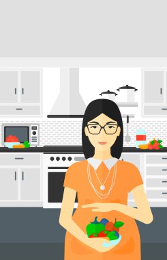 sebze ile hamile kadın.