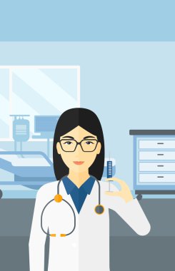 Doktor hastane koğuşunda şırınga.