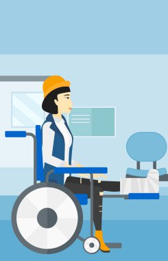 Tekerlekli sandalyede oturan hasta.