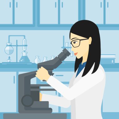 Laboratuar asistanı ile mikroskop.