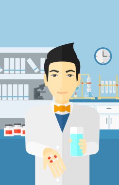 Pharmacist giving pills.