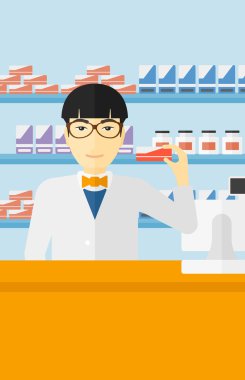 Biraz ilaç gösterilen eczacı.