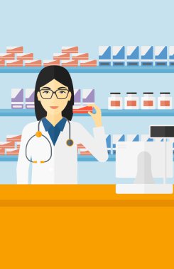 Biraz ilaç gösterilen eczacı.