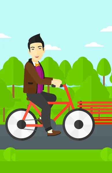 Hombre montar bicicleta. — Vector de stock