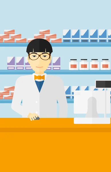 Pharmacist at counter with computer monitor. — Stock vektor