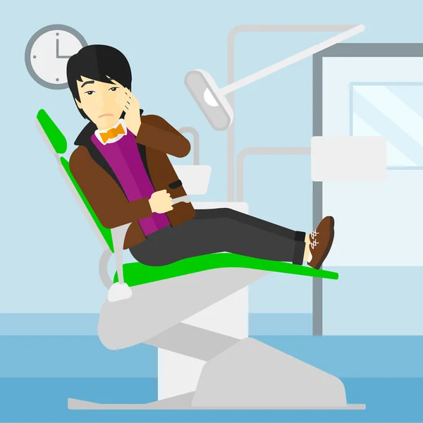 Ember szenved a fogászati szék. — Stock Vector