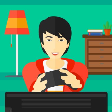 Video oyunu oynayan adam.