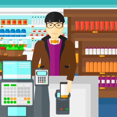 Customer paying with his smartphone using terminal.