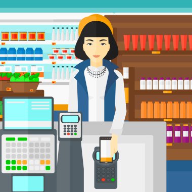 Customer paying with smartphone using terminal.