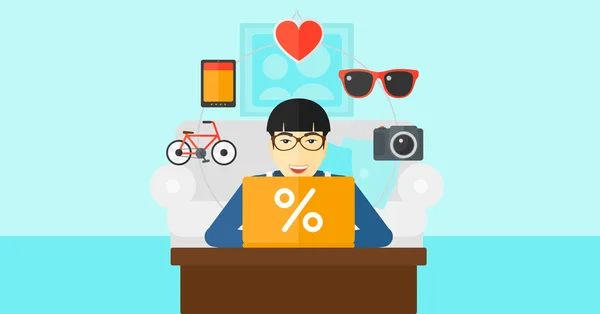 Uomo shopping online utilizzando il suo computer portatile . — Vettoriale Stock