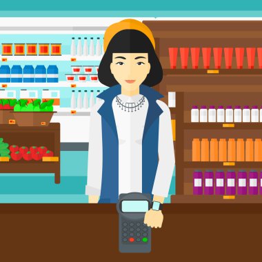 Woman paying with smart watch.