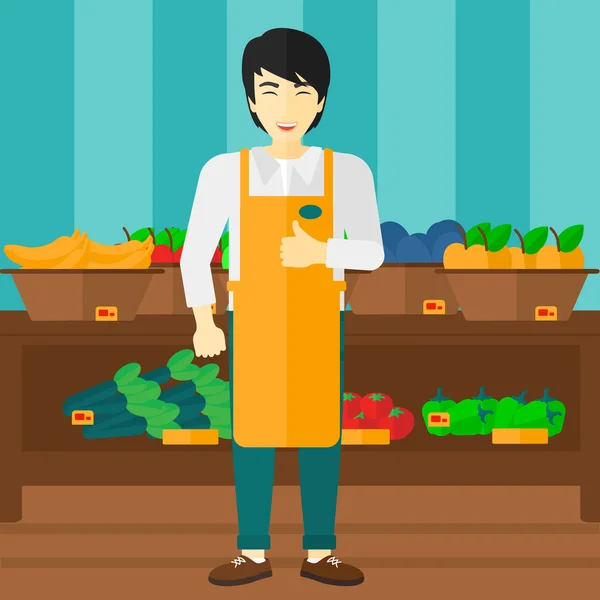 Trabalhador do supermercado com caixa cheia de maçãs . —  Vetores de Stock