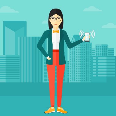 Zil telefon tutan kadın.