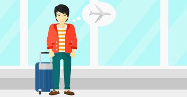 Adam gelecek uçuş tarafından korkmuş.