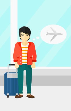 Adam gelecek uçuş tarafından korkmuş.