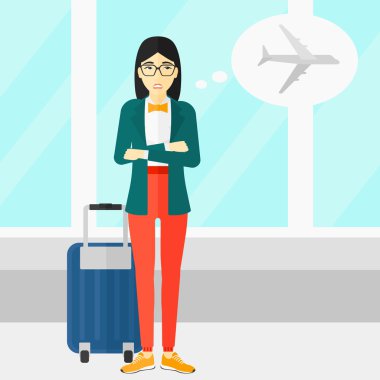 Kadın gelecek uçuş tarafından korkmuş.