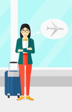 Kadın gelecek uçuş tarafından korkmuş.