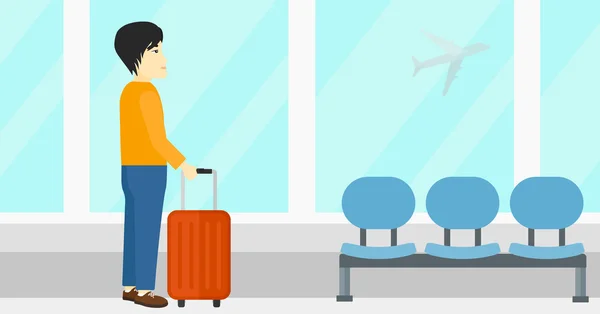 Homme à l'aéroport avec valise . — Image vectorielle
