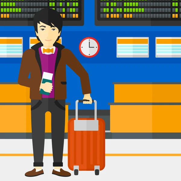 Mann steht mit Koffer und Fahrkarte. — Stockvektor