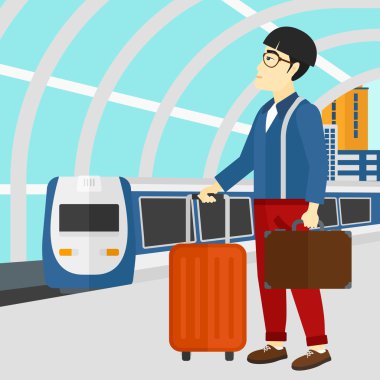 Man with suitcase on wheels and briefcase.