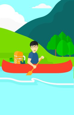 Man canoeing on the river.