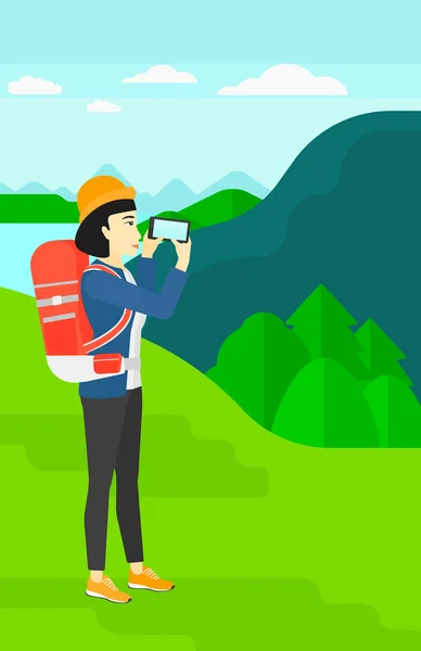 Backpacker taking photo. — Stock Vector