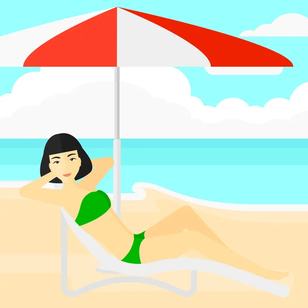 Mujer sentada en chaise longue . — Vector de stock