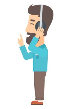 adam kulaklık müzik dinleme